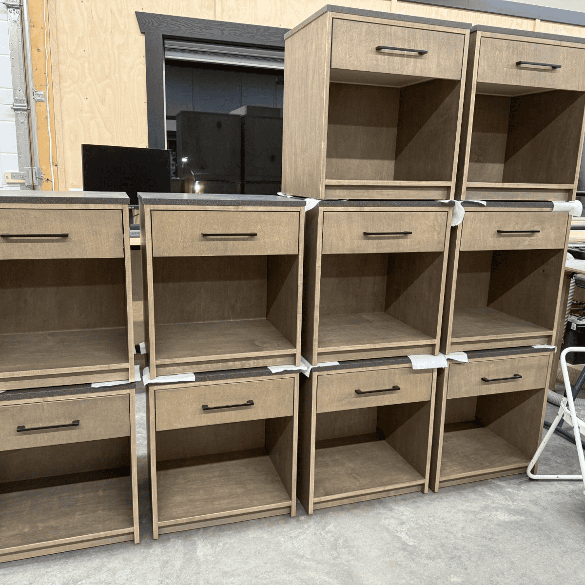 Custom wooden nightstands with drawers and open shelves, showcasing craftsmanship and quality materials by Beaver Custom Builds.